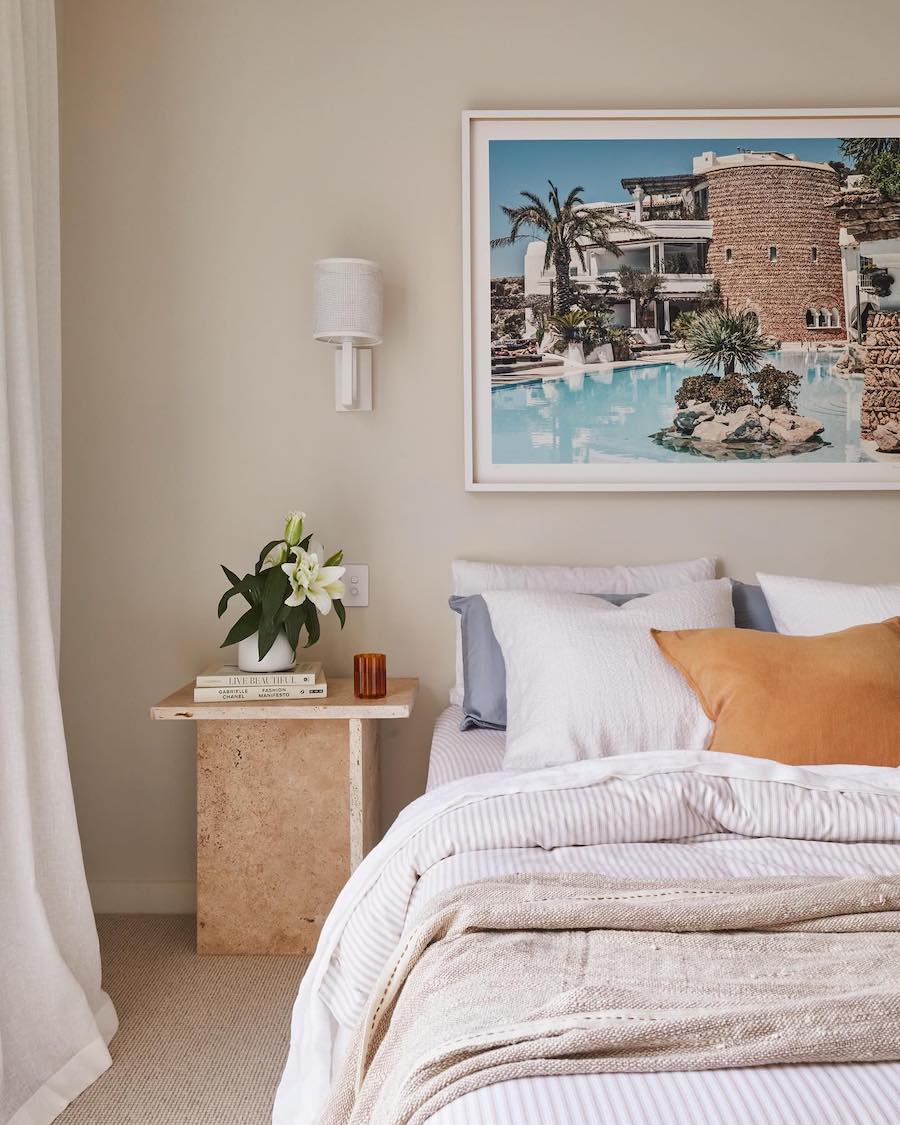 a coastal bedroom with pops of color and Mediterranean vibes