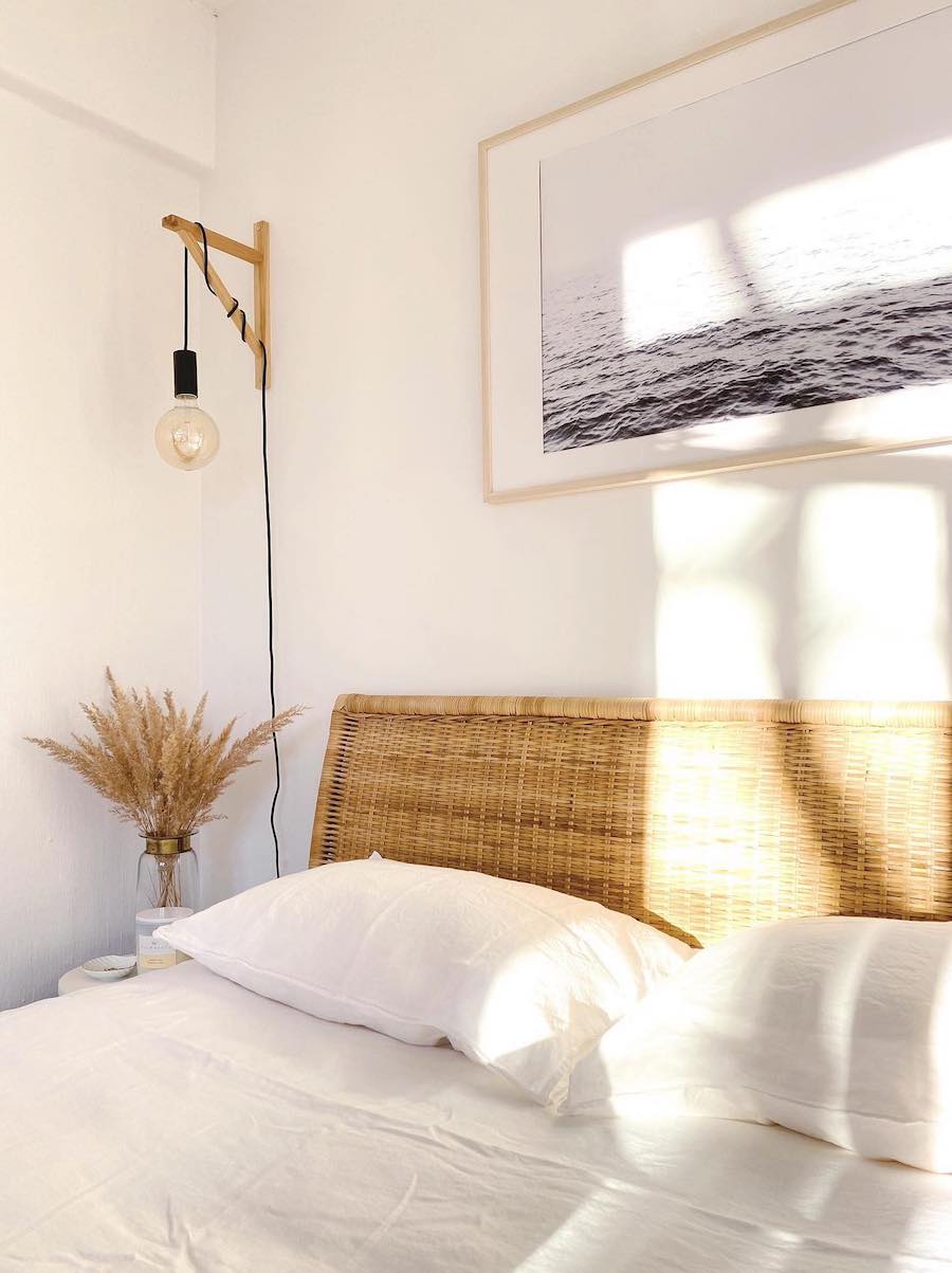 a boho style coastal bedroom with neutral tones