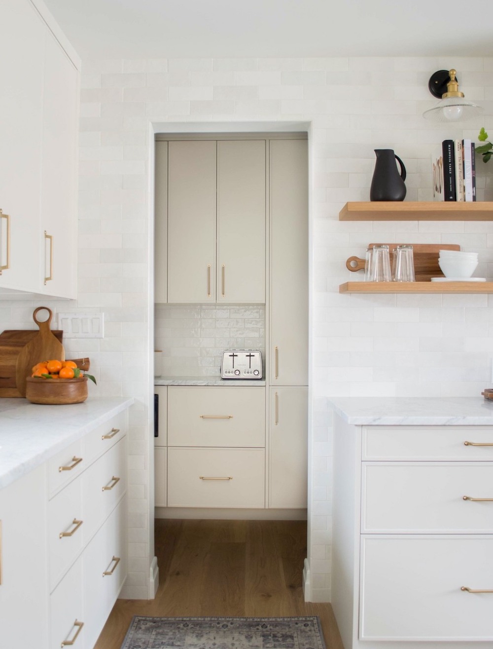 a bright white kitchen with pieces from Ikea