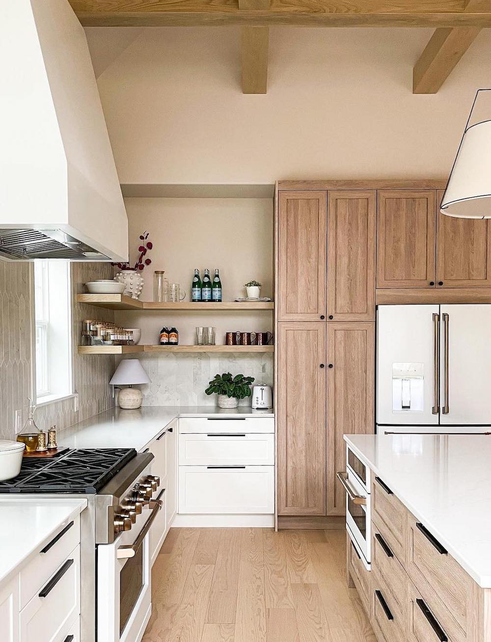 a white and light wood kitchen with pieces from Ikea