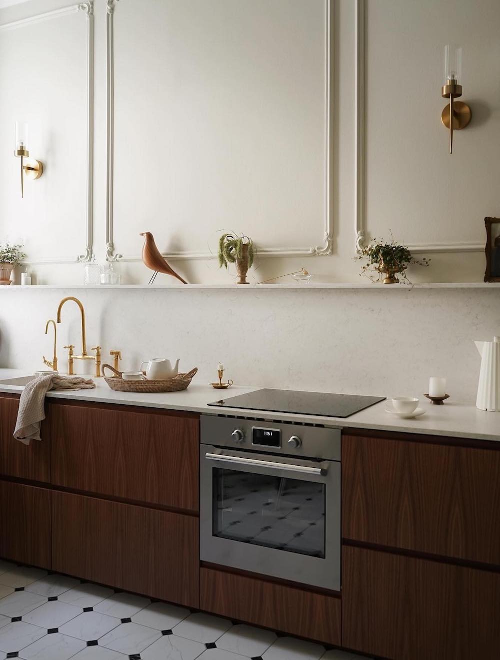 a white and dark wood kitchen with pieces from Ikea