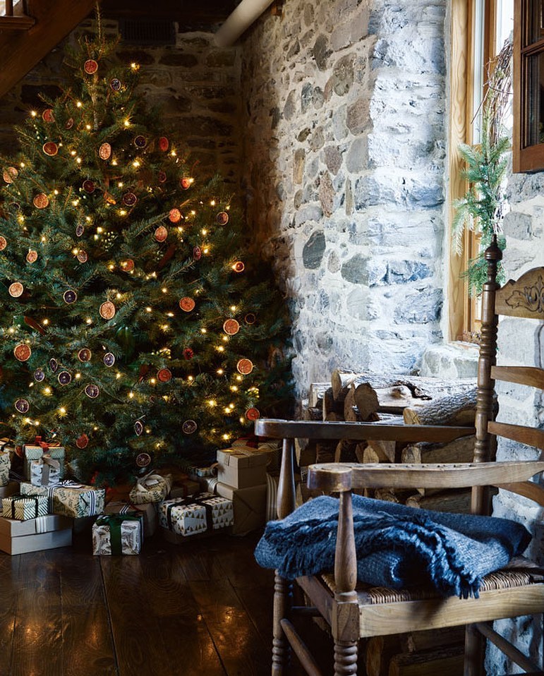 a christmas tree with orange slices and lights