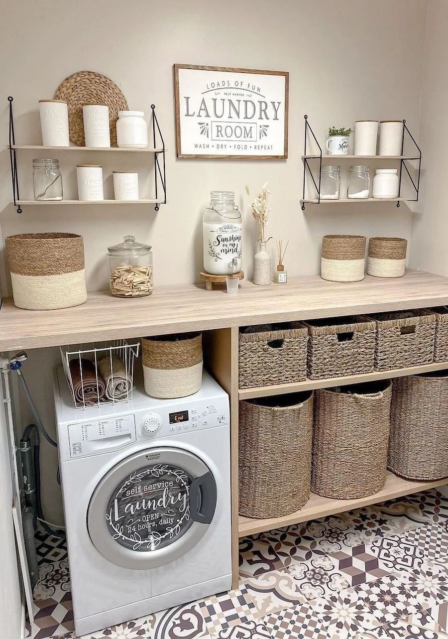 a laundry room with wooden counters, shelves, and hanging shelves