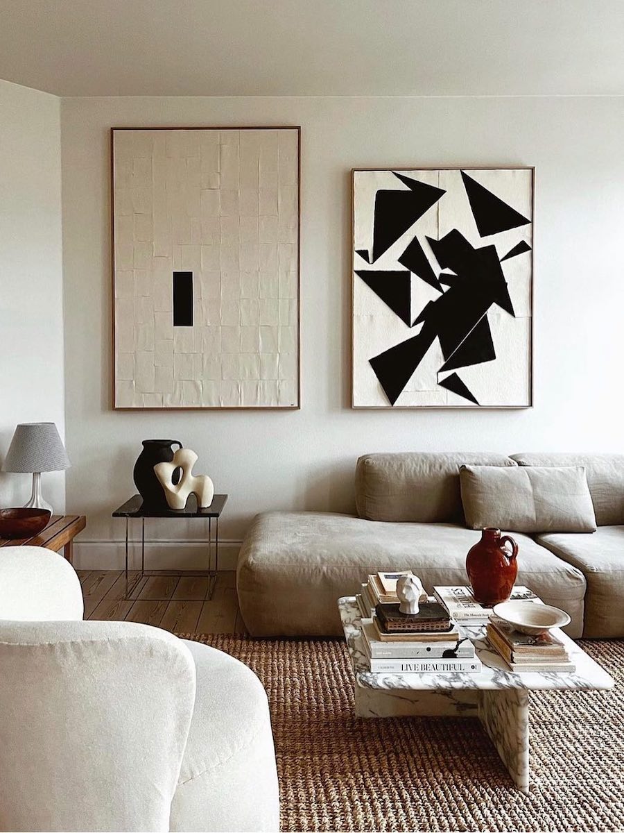 a living room with black and white organic modern decor