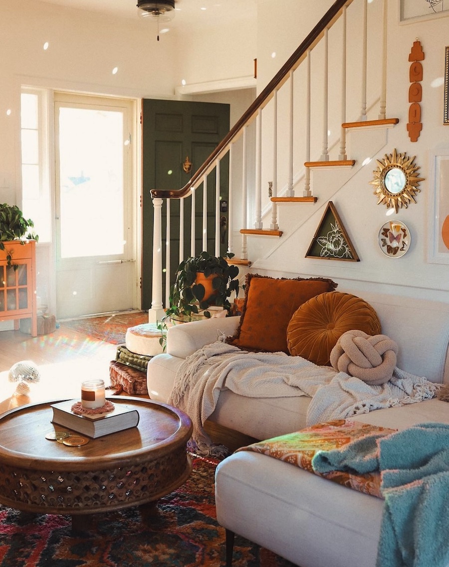 a bohemian living room featuring colorful touches and bold decor