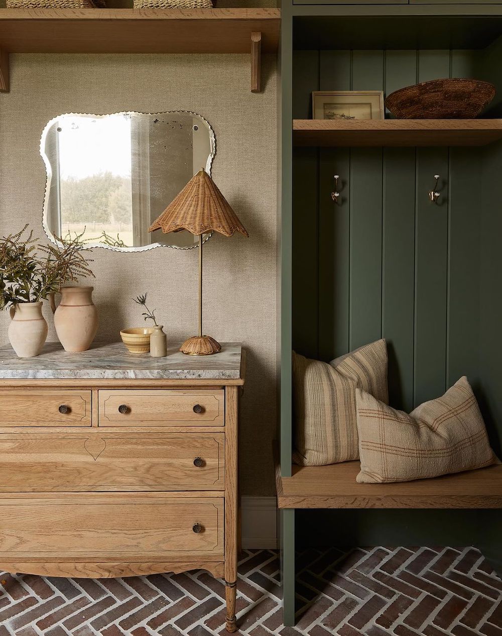 an elegant mudroom with an earthy palette and elevated decor