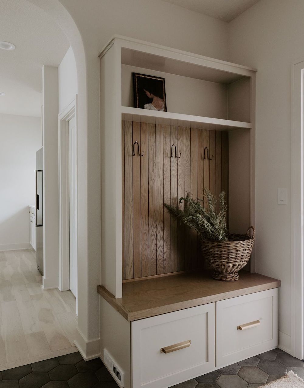 a small mudroom with minimal decor