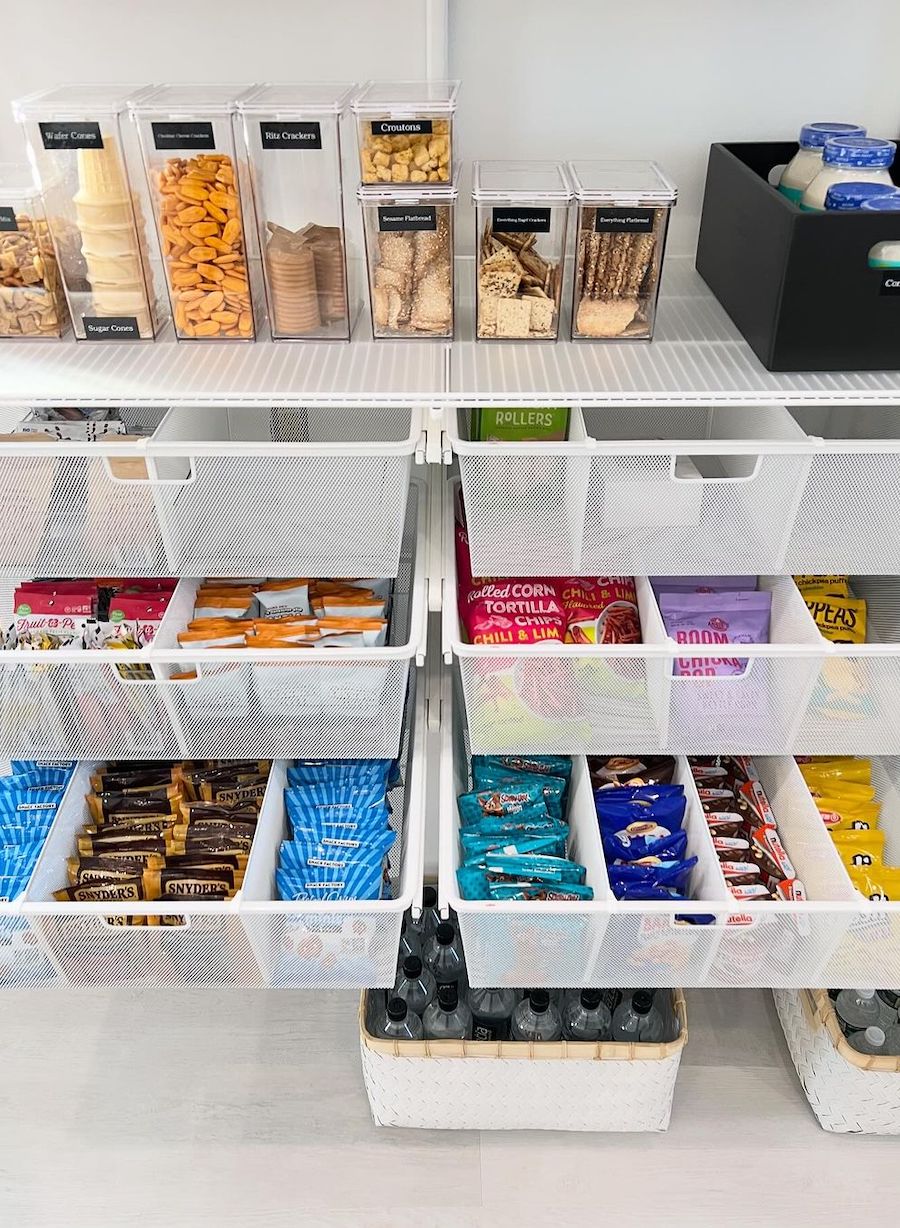 a pantry with mesh wire shelving and pull out drawers